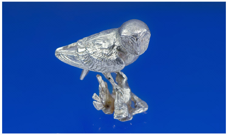 Appraisal: Realistically Modelled Silver Barn Owl The bird is shown perched