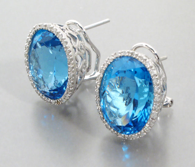 Appraisal: PAIR OF TOPAZ DIAMOND AND FOURTEEN KARAT WHITE GOLD EARRINGS