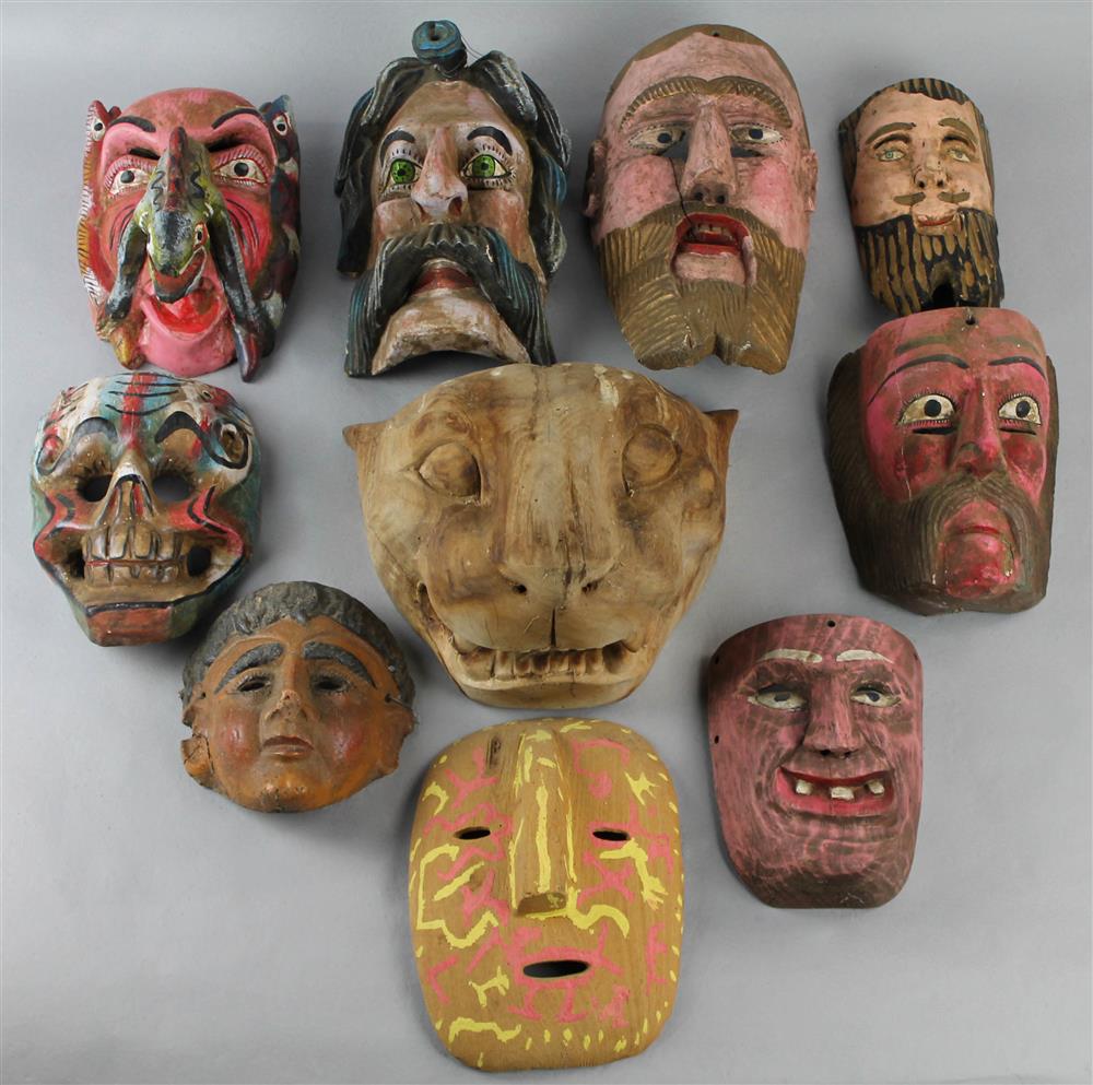 Appraisal: GROUP OF MEXICAN MASKS of painted wood papier mache and