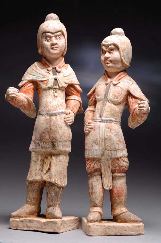 Appraisal: PAIR TANG PAINTED POTTERY FIGURES Pair superbly modeled Chinese Tang