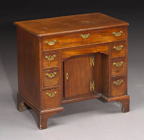 Appraisal: A diminutive George II walnut desk second quarter th century