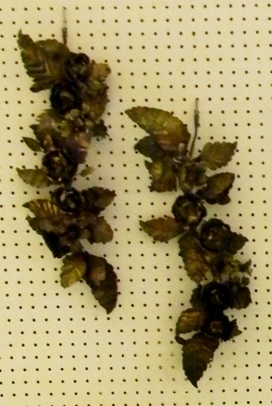 Appraisal: Pair of stamped metal floral garlands '' l some surface