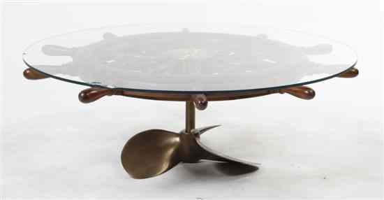 Appraisal: A Brass Ship Wheel Coffee Table having a glass top