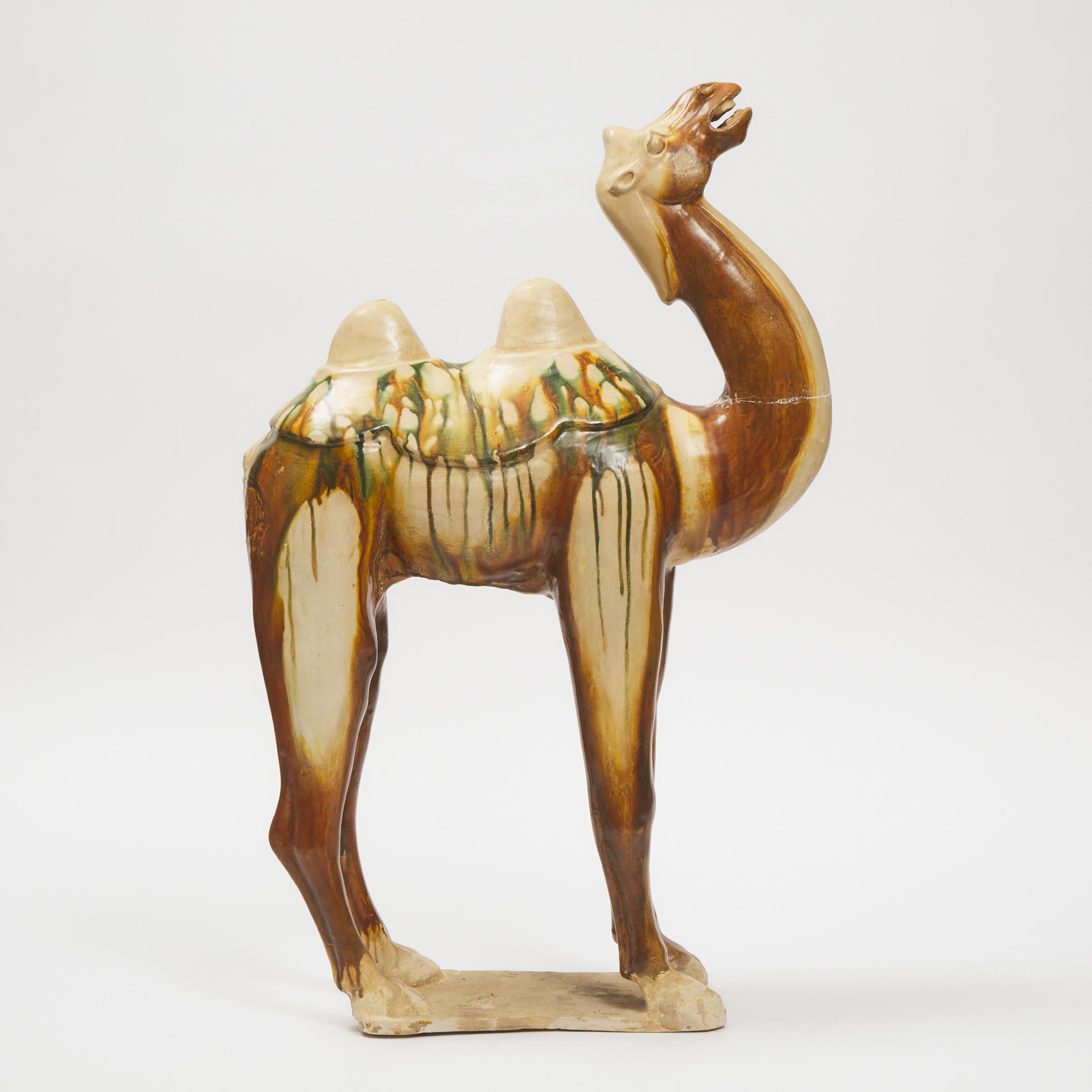 Appraisal: A Large Sancai-Glazed Pottery Figure of a Bactrian Camel Tang