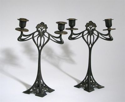 Appraisal: A pair of Art Nouveau W M F pewter twin-branch