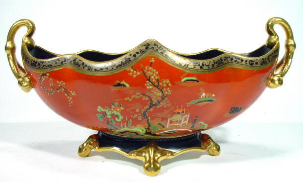 Appraisal: Carltonware boat shaped vase with enamelled chinoiserie decoration onto a