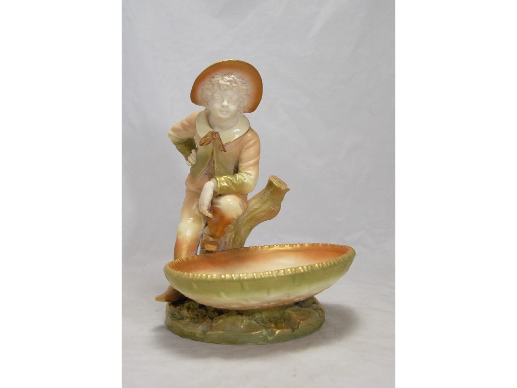 Appraisal: Royal Worcester figural comport modelled as a youth seated on