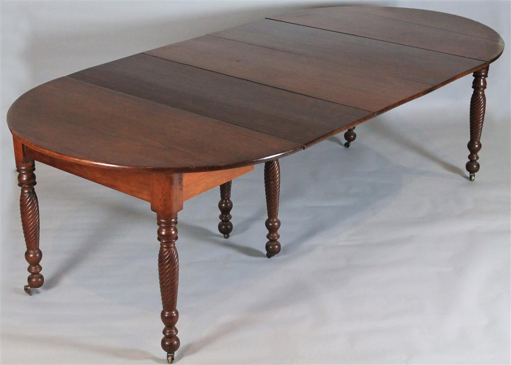 Appraisal: CLASSICAL CARVED MAHOGANY DINING TABLE WITH THREE LEAVES ca the