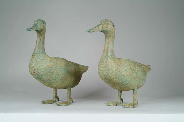 Appraisal: PAIR OF VERDIGRIS BRONZE GEESE FORMED GARDEN FOUNTAIN ORNAMENTS Full