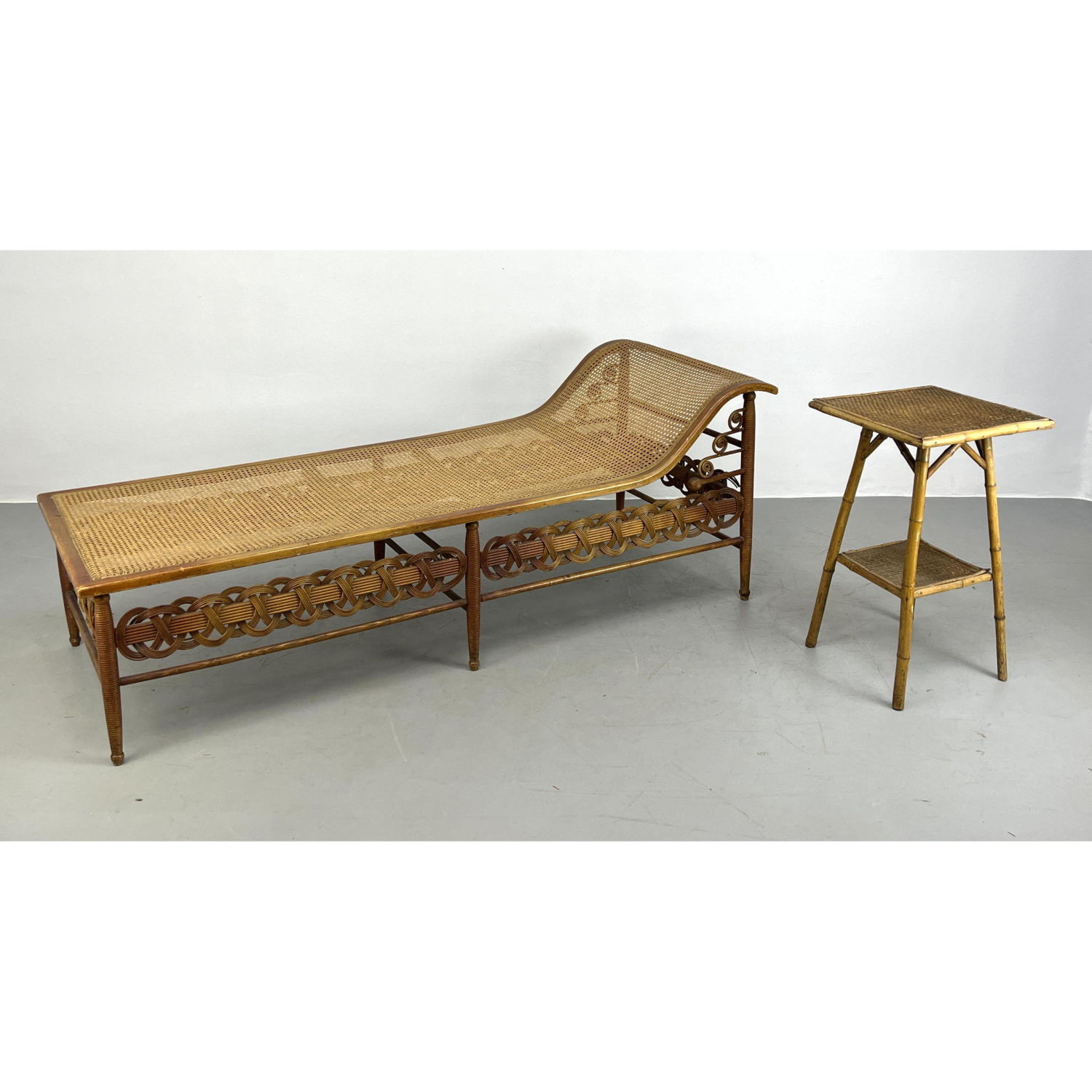 Appraisal: pc Antique Rattan Wicker Furniture Chaise Loung eand Table Dimensions