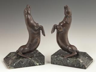 Appraisal: Pair of Patinated Bronze Bookends th c of sea lions