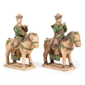 Appraisal: A Pair of Terracotta Equestrian Musician Figures each with polychrome