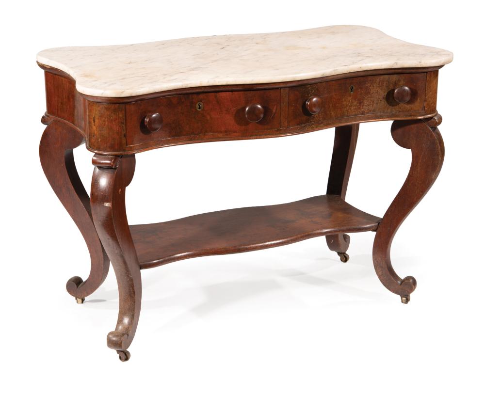 Appraisal: American Late Classical Mahogany Side Table c shaped marble top