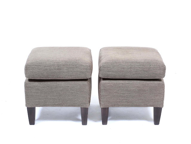 Appraisal: A PAIR OF LOW UPHOLSTERED STOOLS each standing on square