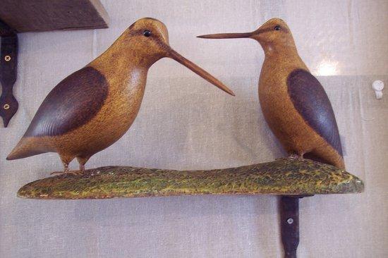 Appraisal: Michael LythgoeA pair of Woodcockcarved and painted cm wide