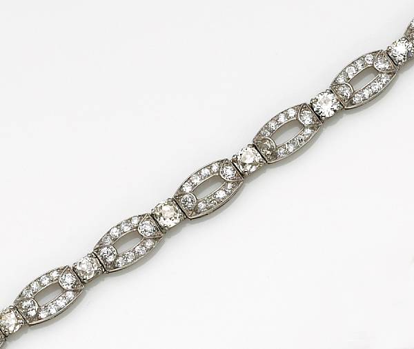 Appraisal: A diamond and platinum bracelet designed with stylized oval-shaped and