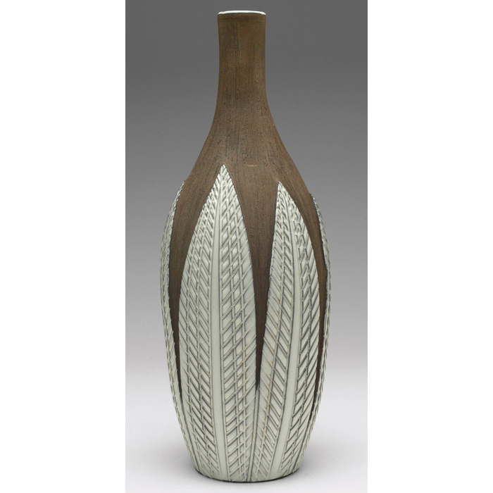 Appraisal: Swedish vase bottle form in brown textured finish with vertical