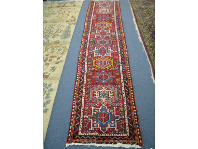 Appraisal: Heriz Persian Handmade Runner overall geometric medallions on red field