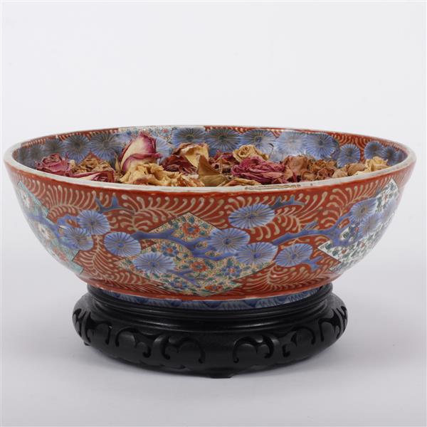 Appraisal: Japanese Imari porcelain enamel punch bowl with floral motifs Dark