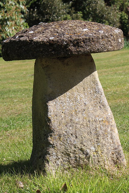 Appraisal: A PAIR OF RECONSTITUTED STONE STADDLE STONES each approximately cm