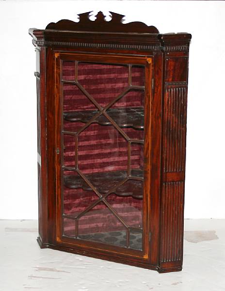 Appraisal: A George III style inlaid mahogany corner cabinet width in