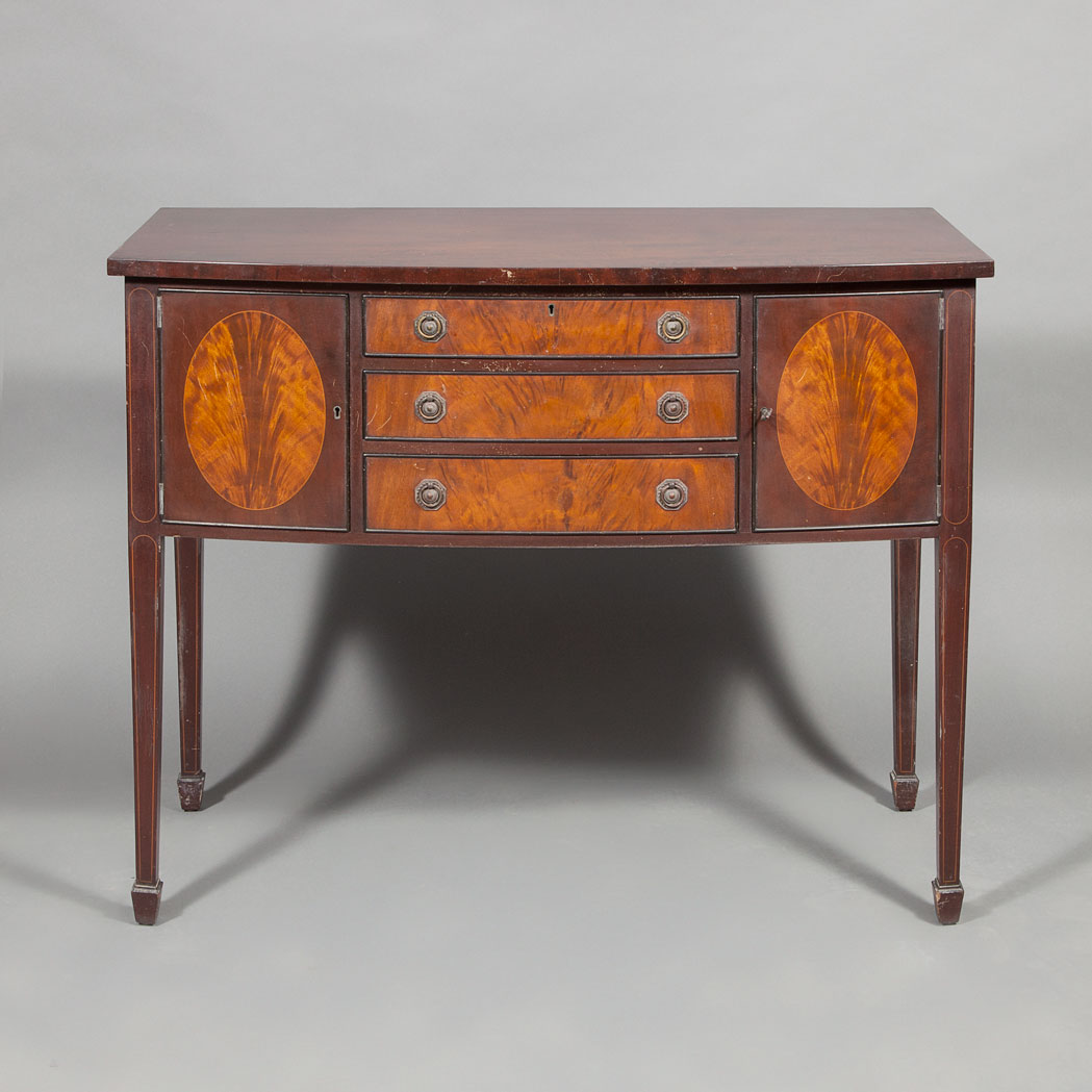 Appraisal: George III Style Inlaid Mahogany Server The bowed rectangular top