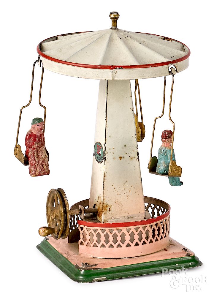 Appraisal: Flying carousel steam toy accessory Doll painted tin flying carousel