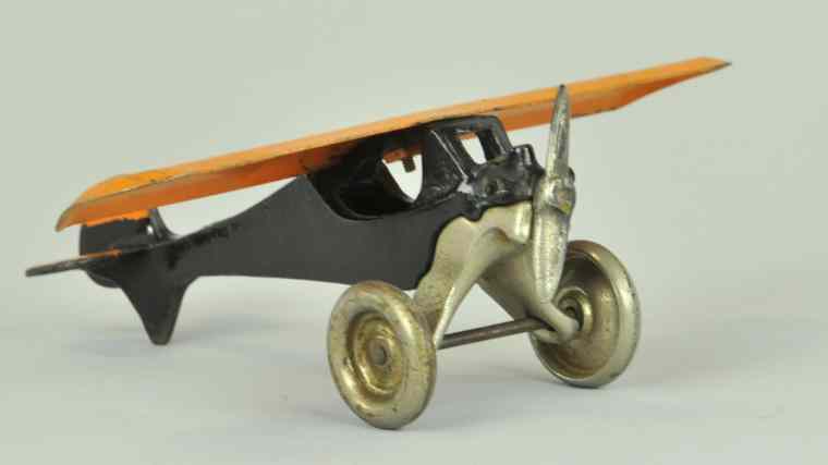 Appraisal: ARCADE ''THE MONOCOUPE'' c cast iron black fuselage with orange