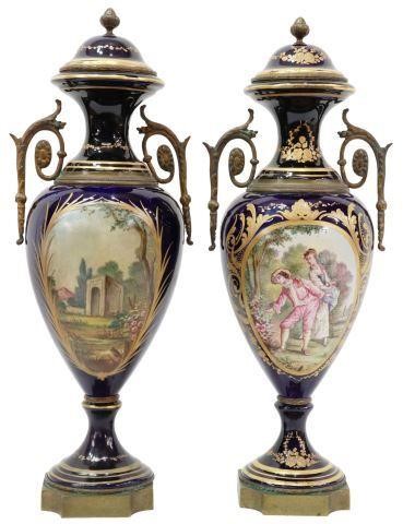 Appraisal: lot of Sevres style ormolu-mounted porcelain urns cobalt-blue glazed ground