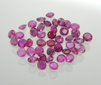 Appraisal: A Group of Unmounted Pink Sapphires Carat There are round