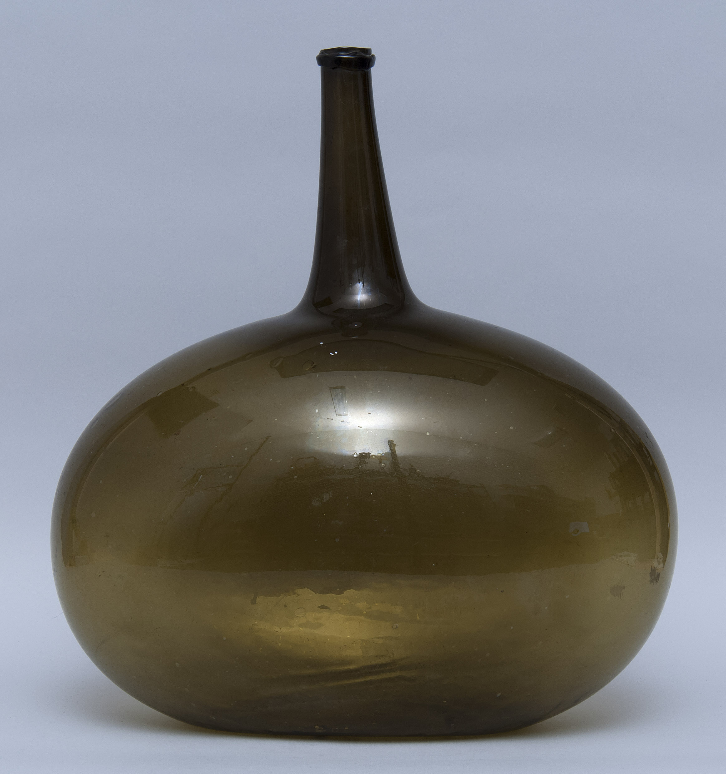 Appraisal: LARGE FREE-BLOWN GLASS BOTTLE Early th CenturyIn olive green Height