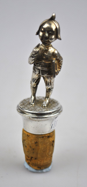 Appraisal: A WMF figural bottle stopper modelled as 'Moritz' Wilhelm Busch