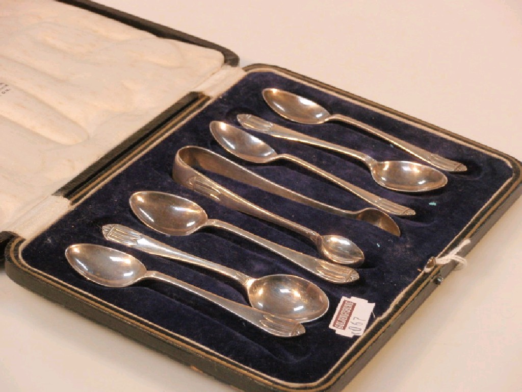 Appraisal: A set of six silver teaspoons and matching sugar tongs