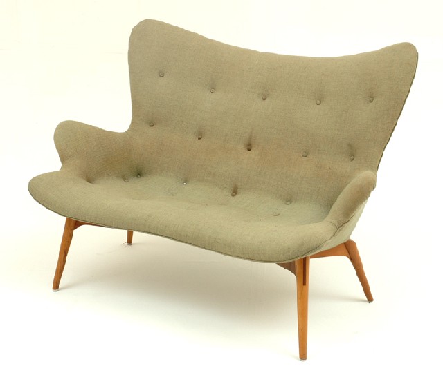 Appraisal: A GRANT FEATHERSTON RS SETTEE Circa The contoured wing back