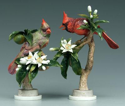 Appraisal: Two Doughty red cardinal figurines male - in one leaf