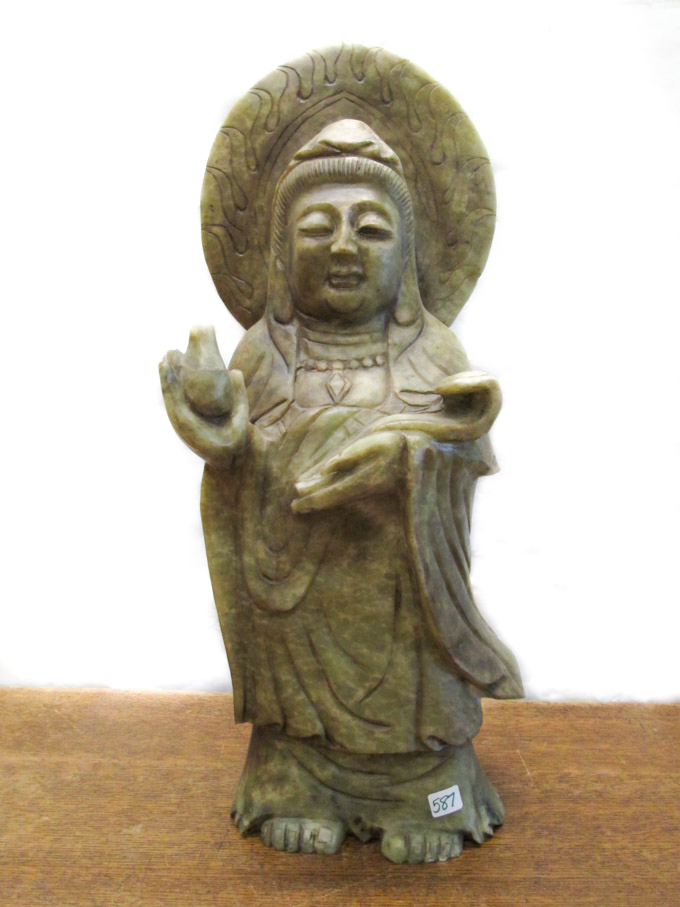 Appraisal: CHINESE CARVED SOAPSTONE GUANYIN in a typical standing pose with