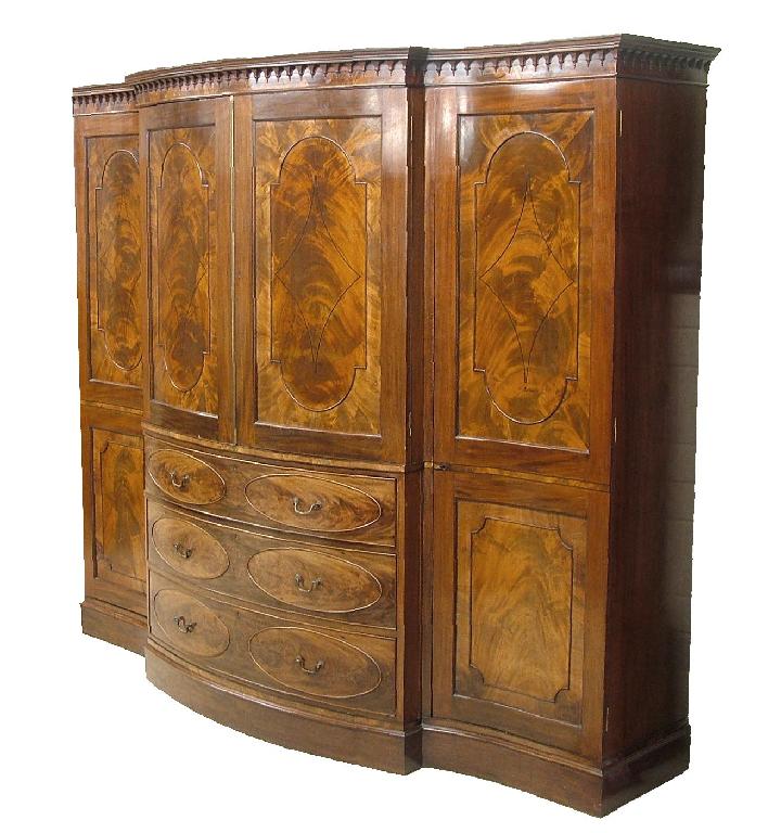 Appraisal: Good mahogany breakfront triple wardrobe by Howard Son Ltd the