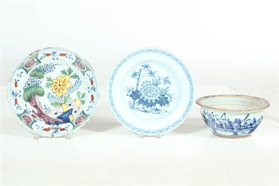 Appraisal: THREE PIECES OF POTTERY Two delft chargers European late th-early