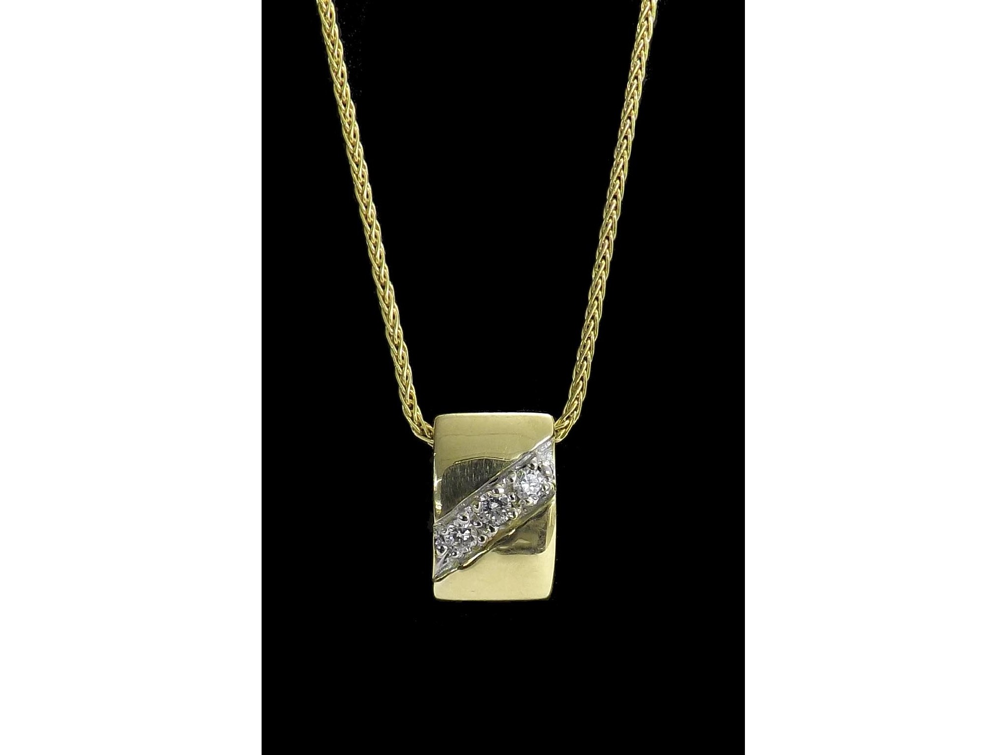 Appraisal: k spiga necklet with a diamond set pendant gm