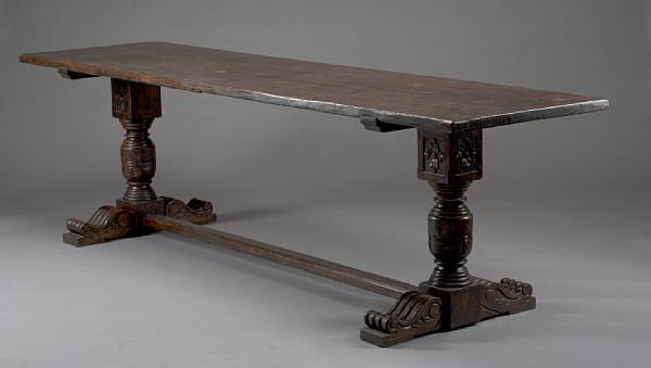 Appraisal: A Continental Baroque style mixed wood refectory table The rectangular