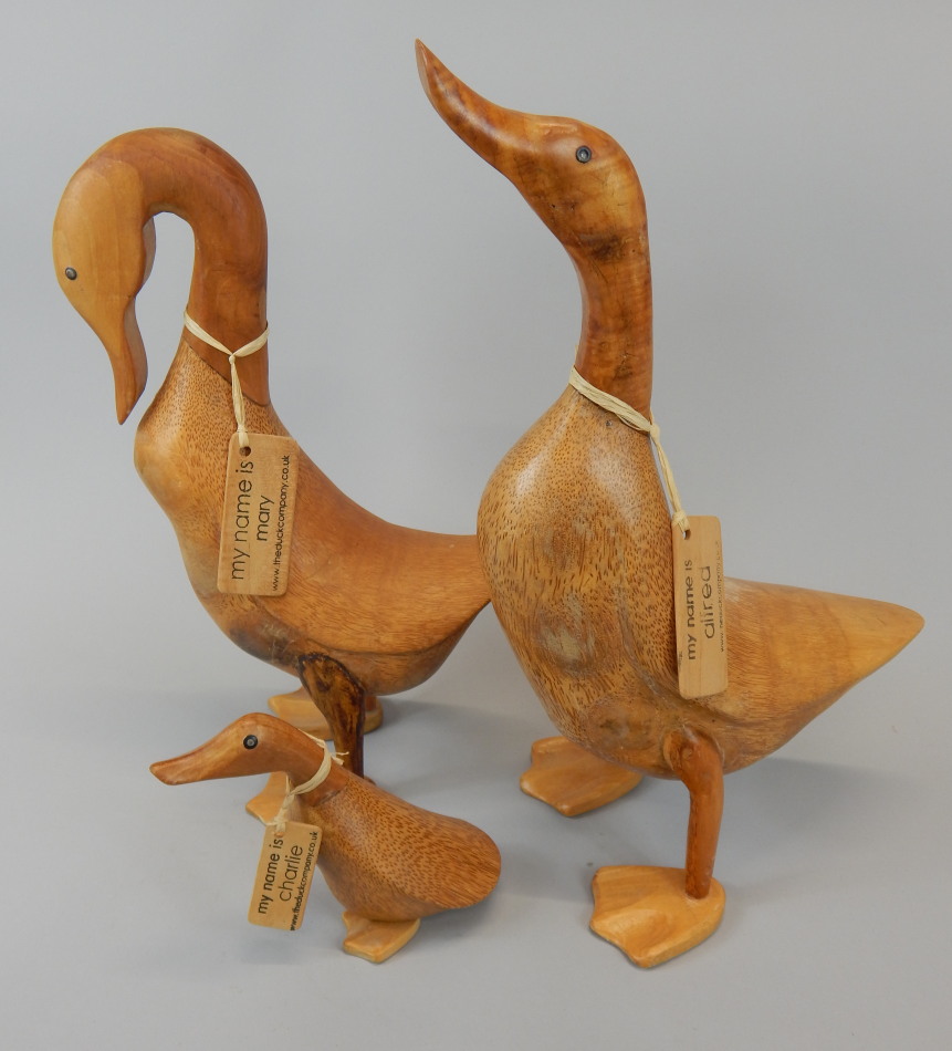 Appraisal: A set of three novelty duck wooden figures made by