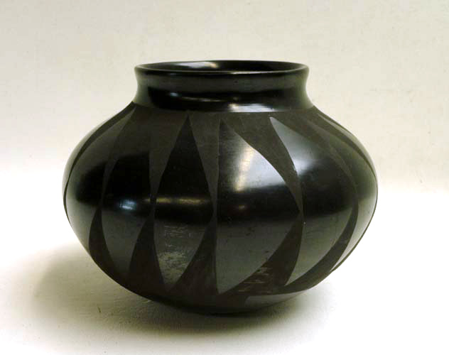 Appraisal: SOUTHWEST BLACKWARE POTTERY VESSEL signed Silveira Vessel has tapering cinched