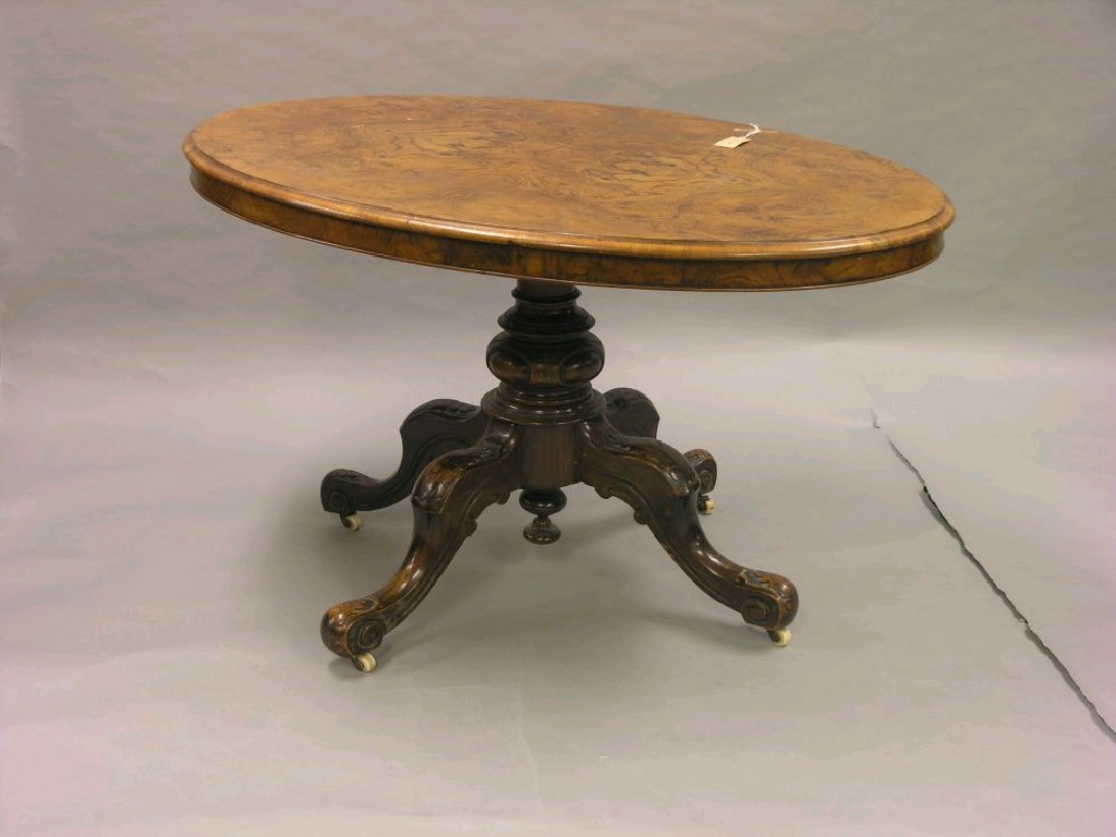 Appraisal: A Victorian burr walnut Loo table quarter-veneered top tilting upon