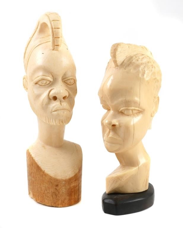 Appraisal: Two old and well-carved African elephant ivory face sculptures Measure