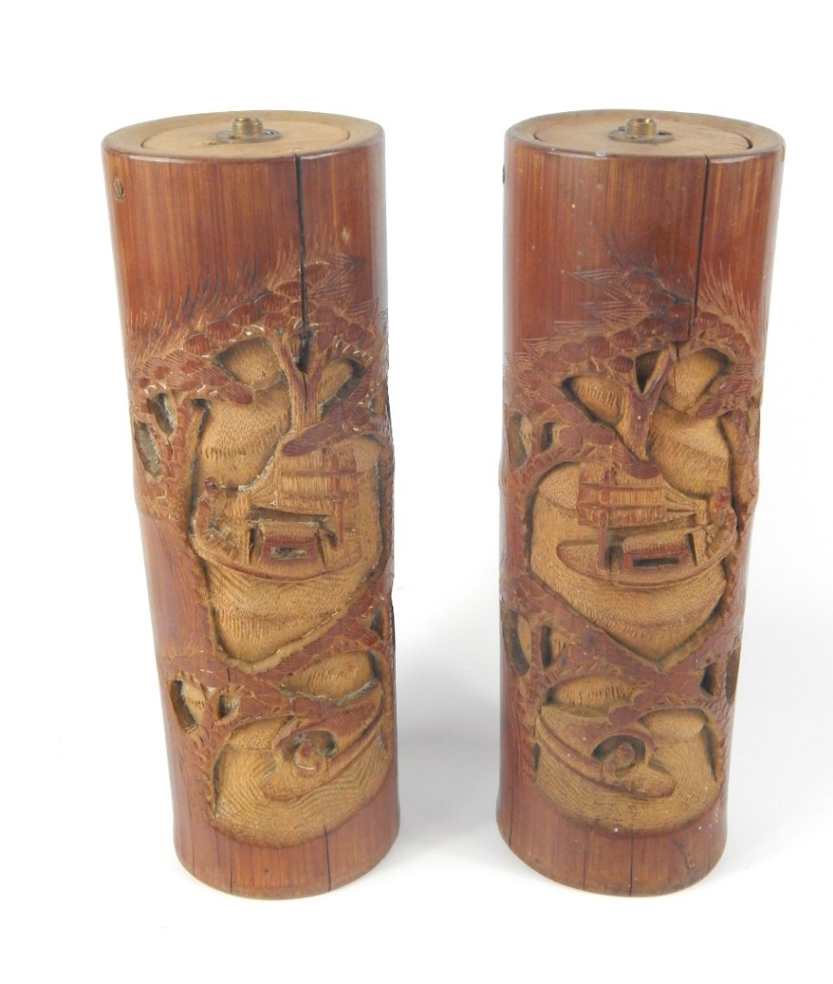 Appraisal: A pair of Chinese carved bamboo brush pots decorated with