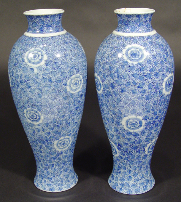 Appraisal: Pair of Japanese porcelain baluster vases printed in blue with