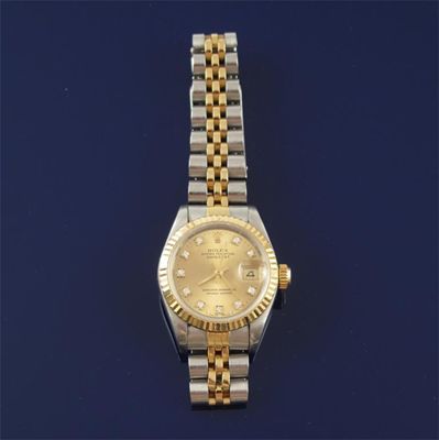 Appraisal: A ladies gold and silver automatic calendar wrist watch by