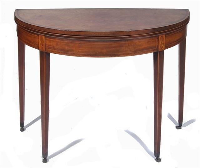 Appraisal: A TH CENTURY MAHOGANY FOLD OVER DEMI-LUNE TEA TABLE with