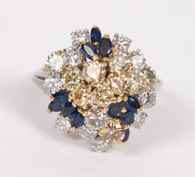 Appraisal: Lady's platinum gold diamond and sapphire ring presenting a cluster