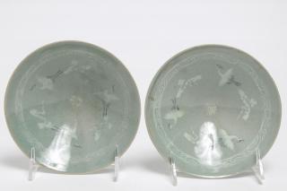 Appraisal: Asian Korean Celadon Glazed Tea Bowls With images of cranes